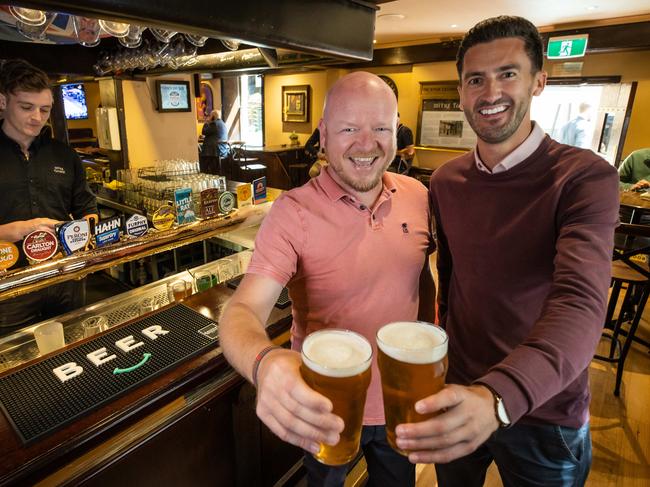 Alex Cooper and Lee Eggleston having a pint at the Mitre Tavern in the CBD. Picture: Jason Edwards