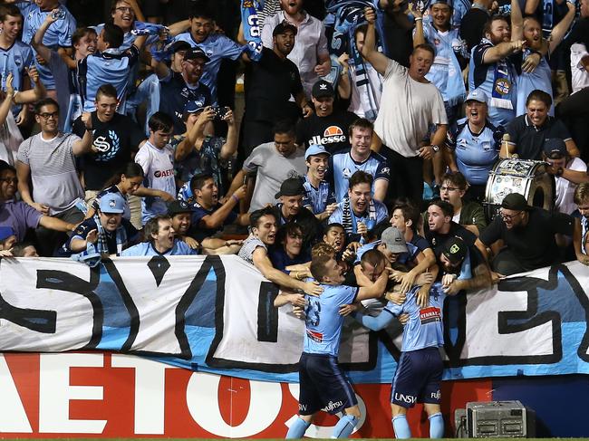 SYDNEY, AUSTRALIA - MARCH 01: Cameron Devlin of Sydney celebrates scoring a goal during the round 21 A-League match between Sydney FC and Adelaide United at Leichhardt Oval on March 01, 2019 in Sydney, Australia. (Photo by Jason McCawley/Getty Images)