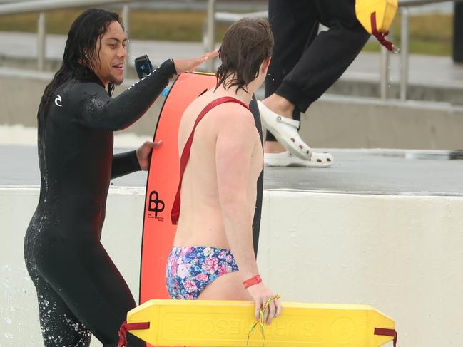 A lifesaver finished the rescue. Picture: Rohan Kelly