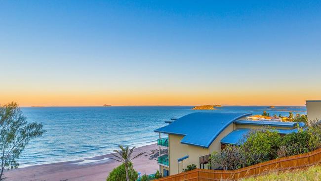 The beachfront home overlooks Keppel Bay and its many islands. Picture: realestate.com.au