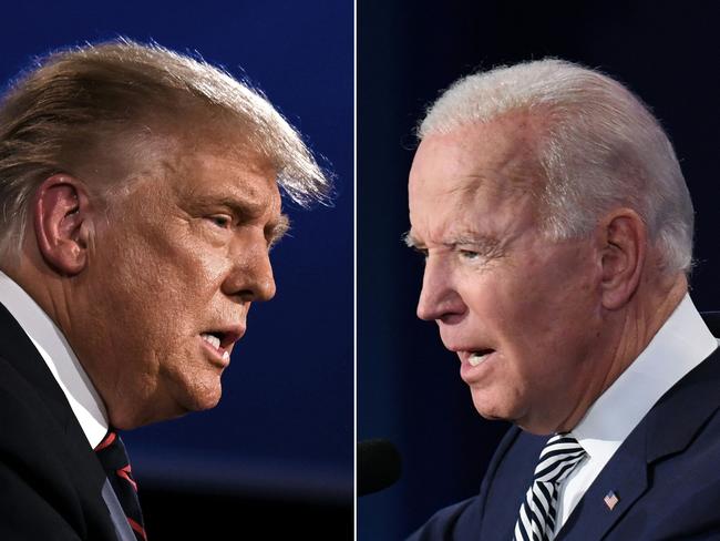 TOPSHOT - (COMBO) This combination of pictures created on September 29, 2020 shows US President Donald Trump (L) and Democratic Presidential candidate former Vice President Joe Biden squaring off during the first presidential debate at the Case Western Reserve University and Cleveland Clinic in Cleveland, Ohio on September 29, 2020. (Photos by JIM WATSON and SAUL LOEB / AFP)