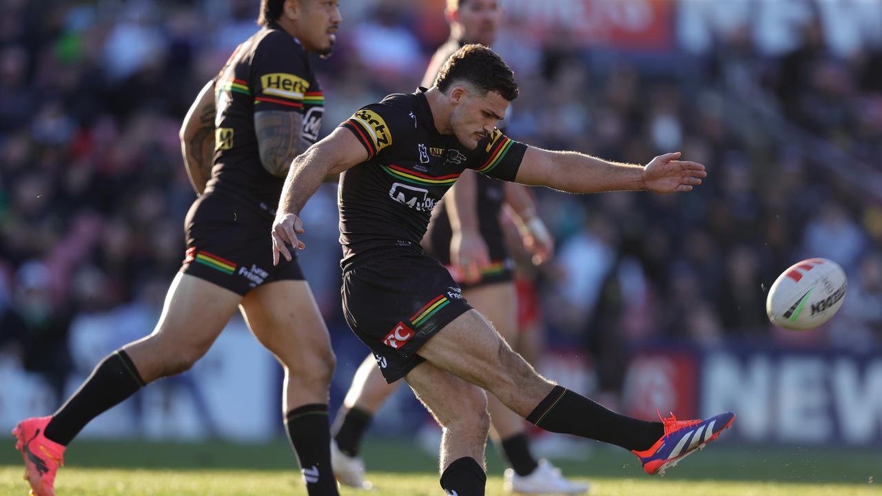 PENRITH, AUSTRALIA - JULY 21: Nathan Cleary of the Panthers kicks the match winning field goal in golden point during the round 20 NRL match between Penrith Panthers and Dolphins at BlueBet Stadium on July 21, 2024 in Penrith, Australia. (Photo by Jason McCawley/Getty Images)