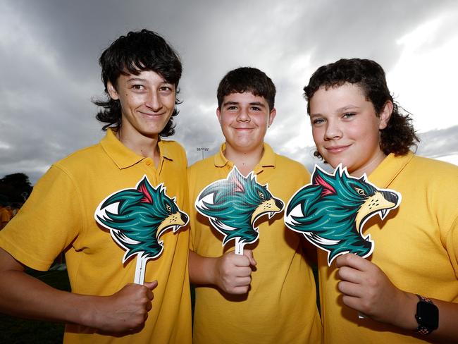 Students of Campbell Town District High School pose with Devils masks at Campbell Town Football Club on Tuesday. (Photo by Michael Willson/AFL Photos via Getty Images)