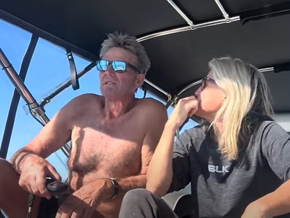 Sam Newman and Sue Stanley after nearly running his boat Angst aground on the Gold Coast. Picture: Supplied