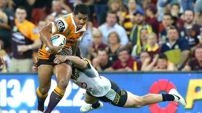 Anthony Milford tries to slip a tackle. Picture: Peter Wallis