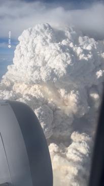 Passenger captures mushroom cloud-like smoke from plane