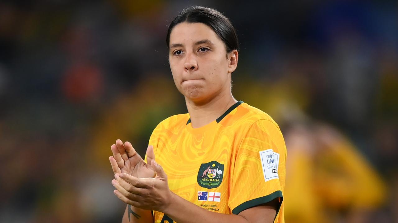 SYDNEY, AUSTRALIA – AUGUST 16: Sam Kerr of Australia applauds fans after the team's 1-3 defeat and elimination from the tournament following the FIFA Women's World Cup Australia &amp; New Zealand 2023 Semi Final match between Australia and England at Stadium Australia on August 16, 2023 in Sydney, Australia. (Photo by Justin Setterfield/Getty Images )