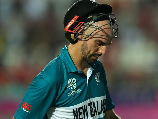 TAROUBA, TRINIDAD AND TOBAGO - JUNE 12: Daryl Mitchell of New Zealand is dismissed during the ICC Men's T20 Cricket World Cup West Indies & USA 2024 match between West Indies and New Zealand at Brian Lara Cricket Academy on June 12, 2024 in Tarouba, Trinidad And Tobago. (Photo by Ashley Allen/Getty Images)