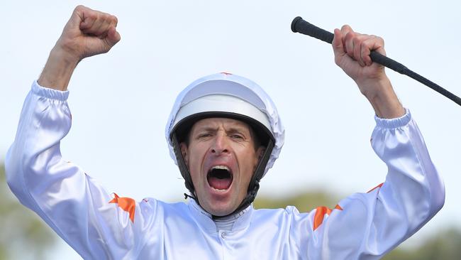 Hugh Bowman didn’t need a crowd to celebrate his first Golden Slipper victory. Picture: AAP