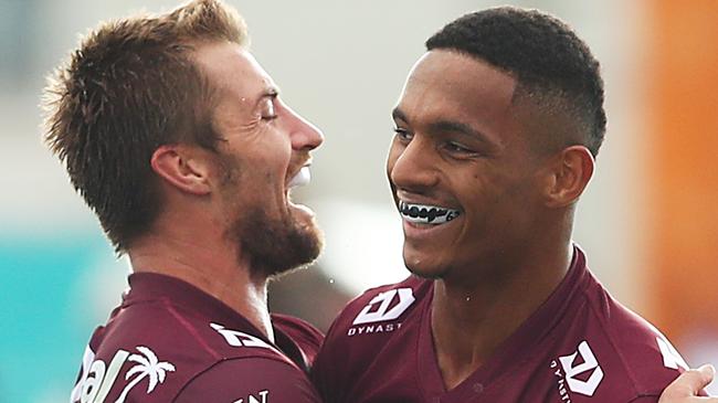 MUDGEE, AUSTRALIA - APRIL 17: Jason Saab of the Sea Eagles celebrates scoring a try with team mate Kieran Foran of the Sea Eagles during the round six NRL match between the Manly Sea Eagles and the Gold Coast Titans at Glen Willow Sporting Complex, on April 17, 2021, in Mudgee, Australia. (Photo by Mark Metcalfe/Getty Images)