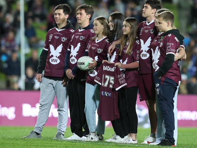 The grandchildren of Bob Fulton present the official match ball ahead of the match. Picture: Mark Metcalfe/Getty Images