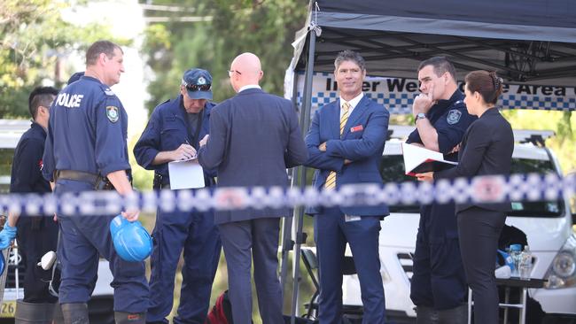 Days after the fatal boarding house fire in Albermarle St Newtown, police and fire investigators are still sifting through the rubble looking for victims. Picture: John Grainger