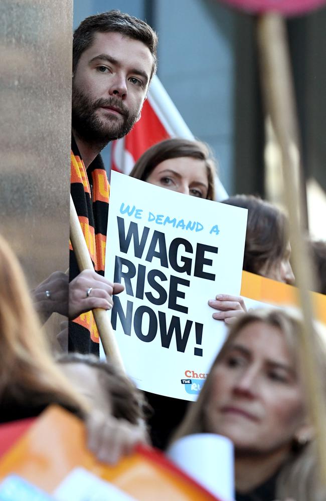 Supporters rally outside the offices of the Fair Work Commission in Melbourne after the Fair Work Commission increased the national minimum wage by 3.5 per cent. Picture: AAP Image/Joe Castro