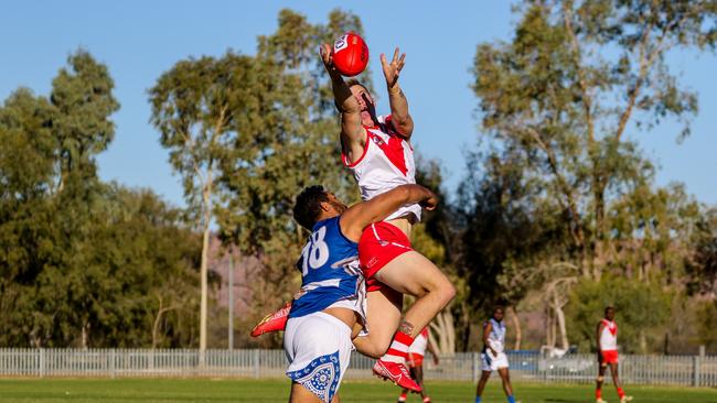 Federal's Braydon Weily takes a big mark over Souths' Thomas Gorey. Picture: Charlie Lowson