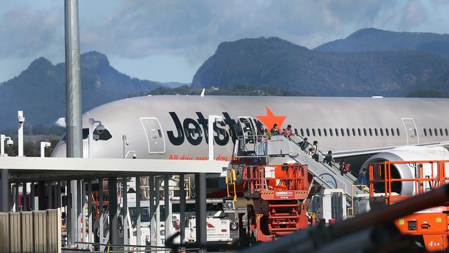 Passengers disembark from a Jetstar flight on the Gold Coast. Photo: Regi Varghese