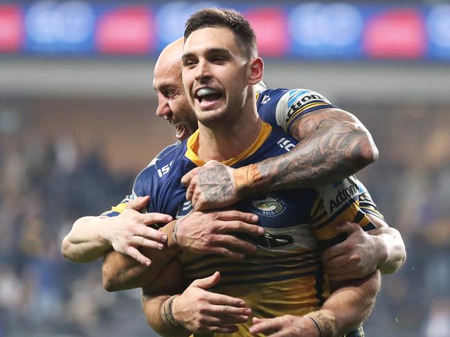 SYDNEY, AUSTRALIA - JUNE 12: Blake Ferguson and Ryan Matterson of the Eels celebrate Ryan Matterson scoring a try during the round five NRL match between the Parramatta Eels and the Penrith Panthers at Bankwest Stadium on June 12, 2020 in Sydney, Australia. (Photo by Mark Kolbe/Getty Images)