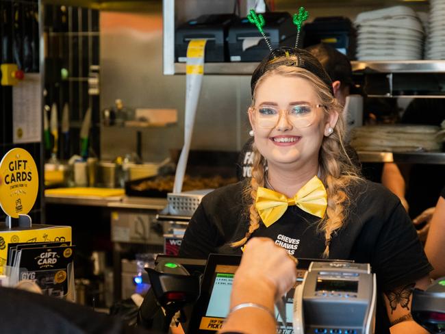 Juliette Keane has a blast working at Guzman y Gomez's Willows store. Picture: Supplied.