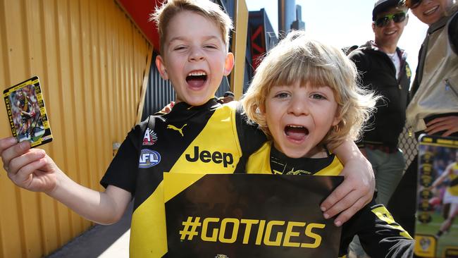 Brothers Archie Sideridis, 6, and Marcus, 5, were two of hundreds of supporters who turned out at Punt Road on Thursday. Picture: Michael Klein