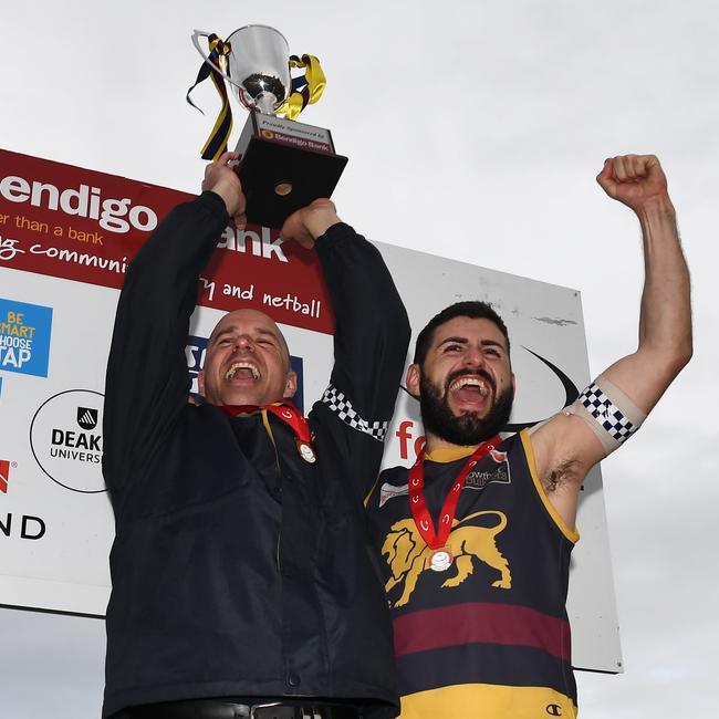 Nick Batsanis (right) celebrates after winning the 2018 EFL Division 2 flag. Picture: AAP Image/James Ross