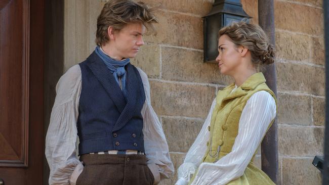 Thomas Brodie-Sangster and Maia Mitchell in a scene from The Artful Dodger.