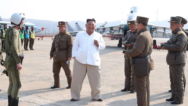 This undated picture released from North Korea's Korean Central News Agency on April 12, 2020 shows Kim Jong-un inspecting a pursuit assault plane group. Picture: KCNA via AFP.