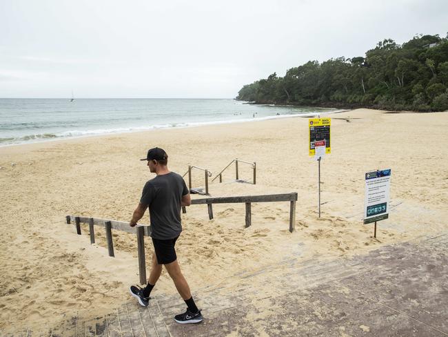 An empty Noosa Main Beach on Good Friday 2020, which would normally be packed with thousands of Easter Holiday Makers. Photo Lachie Millard