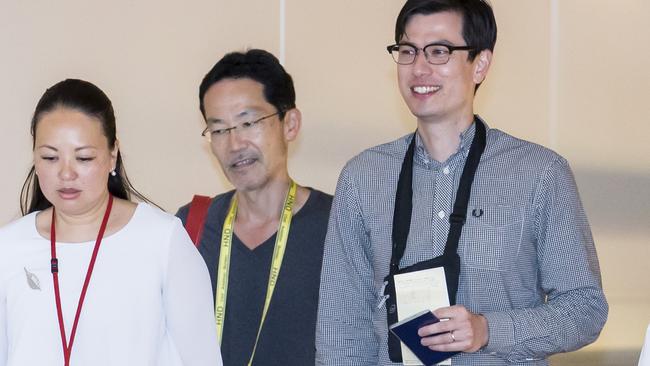 Alek Sigley (R) at Haneda Airport in Tokyo after being released. Picture: Getty Images.