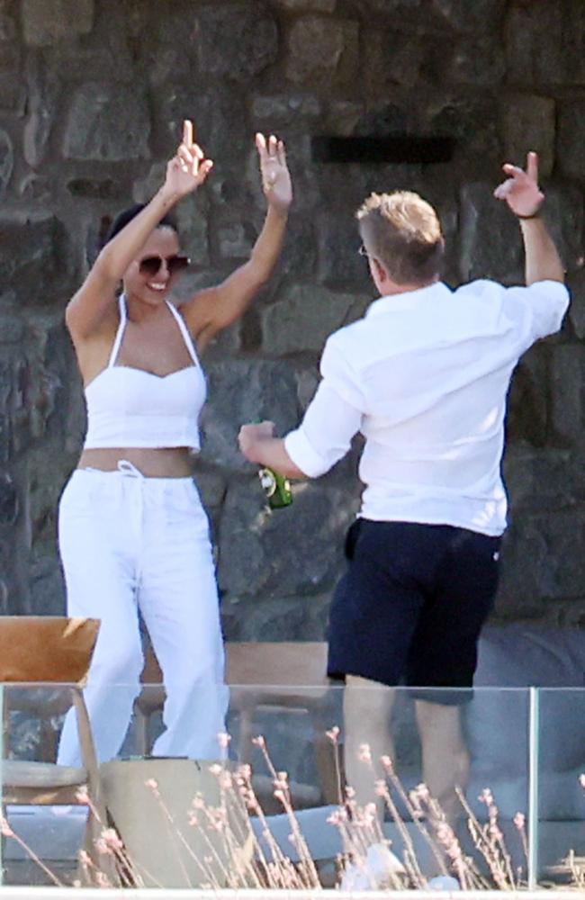 Matt Damon and his wife Luciana Barroso dance at the group’s rented mansion. Picture: Backgrid