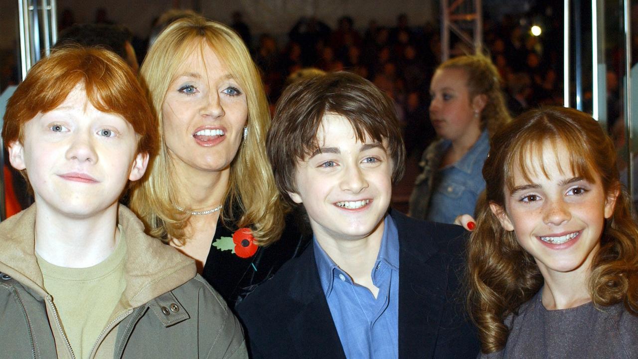 L-R: Rupert Grint, Daniel Radcliffe and Emma Watson with JK Rowling, at back, at the premiere of Harry Potter and the Philosopher's Stone in 2001. Picture: AP Photo/William Conran/PA