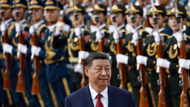 Chinese President Xi Jinping welcomes Bahrain King Hamad bin Isa Al Khalifa at the Great Hall of the People in Beijing.