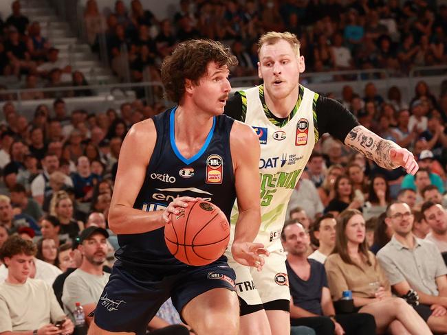 Rhys Vague, pictured defending Melbourne United’s Kyle Bowen, is a key in for the Cougars. Picture: Getty Images