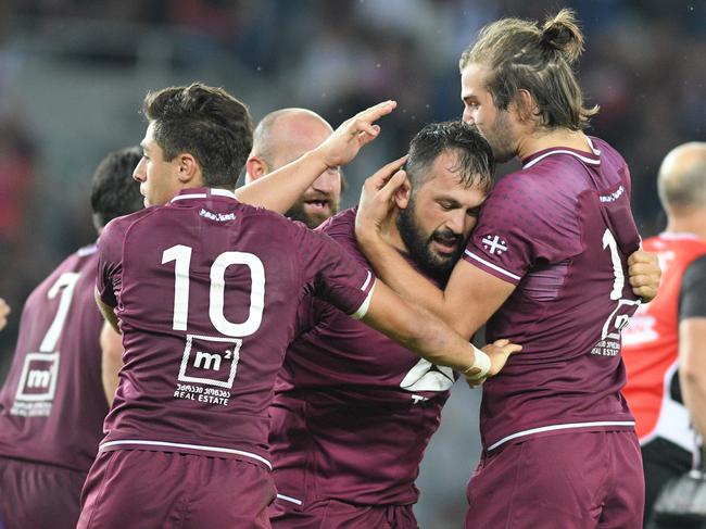 TBILISI, GEORGIA - AUGUST 31: Tedo Abzhandadze, Karlen Asieshvili and Mirian Modebadze of Georgia celebrate their try during the rugby international match between Georgia and Scotland at Dinamo Arena on August 31, 2019 in Tbilisi, Georgia. (Photo by Levan Verdzeuli/Getty Images)