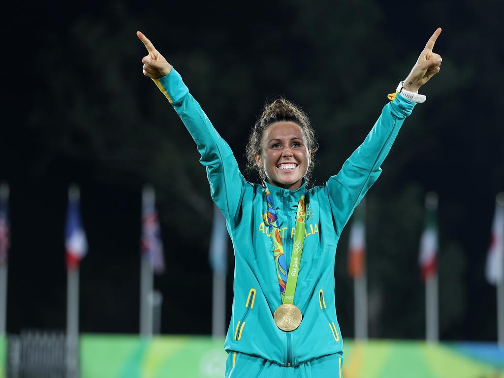 Gold medalist Chloe Esposito of Australia poses on the podium during the medal ceremony for the women’s modern pentathlon.