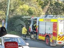 Rural Fire Service and NSW Fire and Rescue brigades were called to deal with sheets of building material that had blown on to Mona Vale Rd at Ingleside during Friday's morning peak. There were initial concerns the sheeting may have been made of asbestos.  Picture:  RFS (Ingleside)