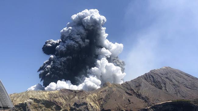 FILE - In this Monday, Dec. 9, 2019, file photo provided by Lillani Hopkins, shows the eruption of the volcano on White Island off the coast of Whakatane, New Zealand. (Lillani Hopkins via AP, file)