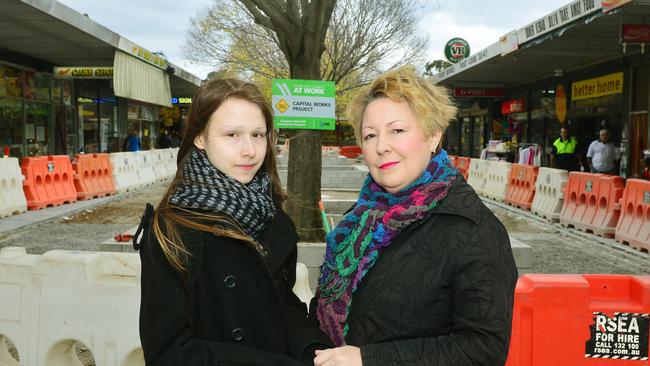 Anne Sash with daughter Meredith and where Horsey used to live at the Dargie Court shops. Picture: Carmelo Bazzano