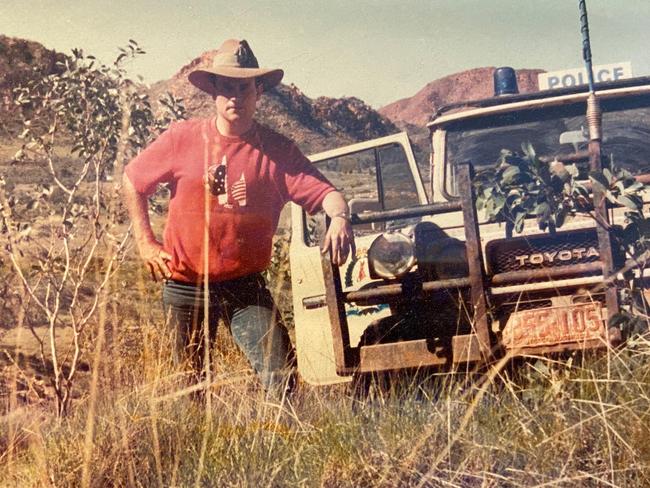 John Elferink in 1986 when he was a serving officer in the Northern Territory Police Force.  Taken in western desert country in the Macdonnell Ranges -  it was on the inside of the Gosses Bluff (Ngnorla) meteorite crater.