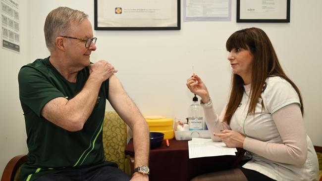 Mr Albanese prepares to receive his fourth dose of the COVID-19 vaccine at Adore Compounding Pharmacy in Rozelle. Picture: Dean Lewins – Pool/Getty Images