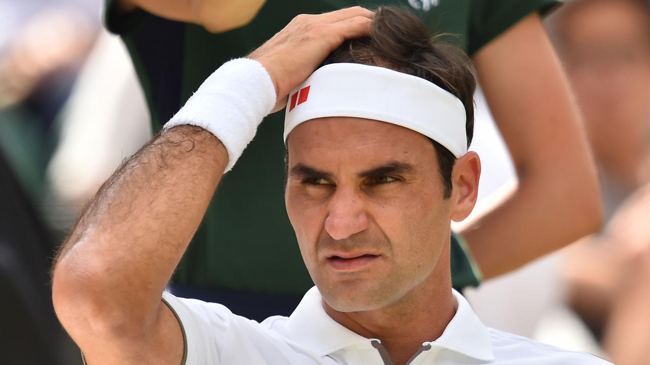 Switzerland's Roger Federer wasn’t happy with his slow start to his first-round clash. (Photo by Glyn KIRK / AFP)