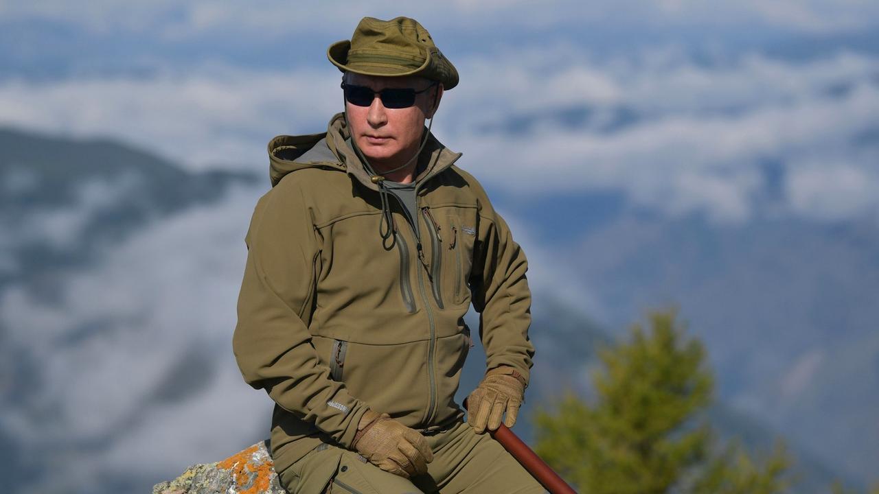 Putin stops to take in the scenery after shooting an eagle out of the sky with one clean shot. Picture: Anadolu Agency/Getty Images