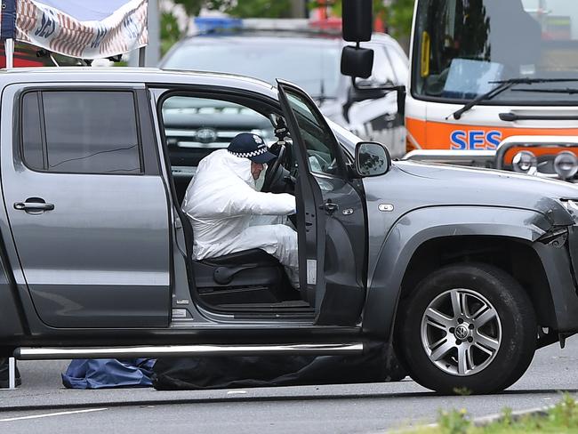 An SUV is seen on The Mountain Highway in Bayswater in Melbourne, Saturday, November 9, 2019.  A man was found dead in a van on the Eastlink Freeway afer an overnight shooting. (AAP Image/Julian Smith) NO ARCHIVING