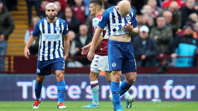 Brighton’s Aaron Mooy reacts after being sent off against Aston Villa at Villa Park. Picture: Getty Images