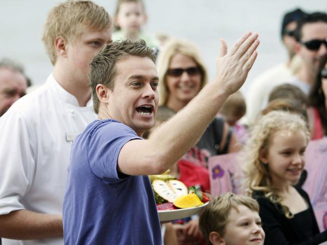 Former Sunrise weatherman Grant Denyer reporting from Palm Cove in 2013.