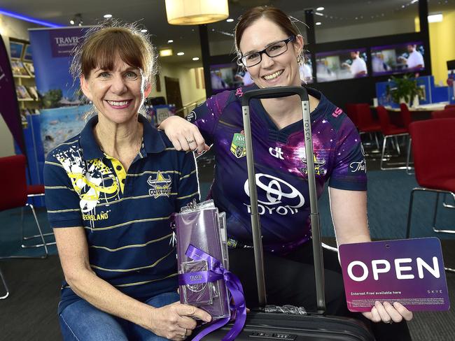 Townsville City Travel Associations are struggling after their shop has become a ghost town due to the coronavirus. Marketing manager Hannah Leith (PURPLE) and Townsville store manager Gail Barnes.  PICTURE: MATT TAYLOR.