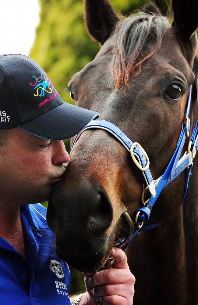 Moody kisses champion mare Black Caviar, who made him a household name.