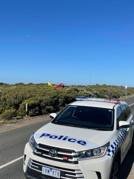 The lifesaver helicopter and police attended the scene at Thirteenth Beach. Picture: Toby Lee.