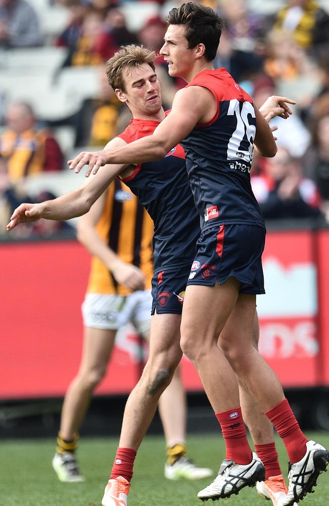 Dom Tyson celebrates with Sam Weideman.