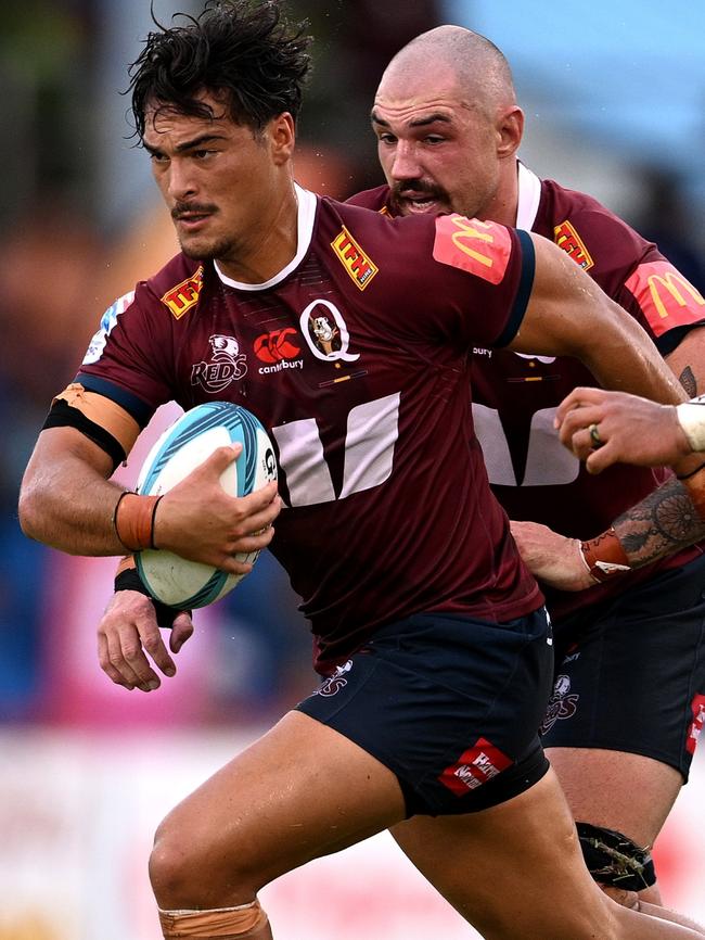 Jordan Petaia on the charge for Queensland Reds.