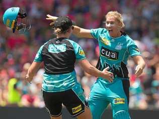 Delissa Kimmince, of the Heat, celebrates winning the match during the Women's Big Bash League (WBBL) final  in Sydney. Picture: STEVE CHRISTO