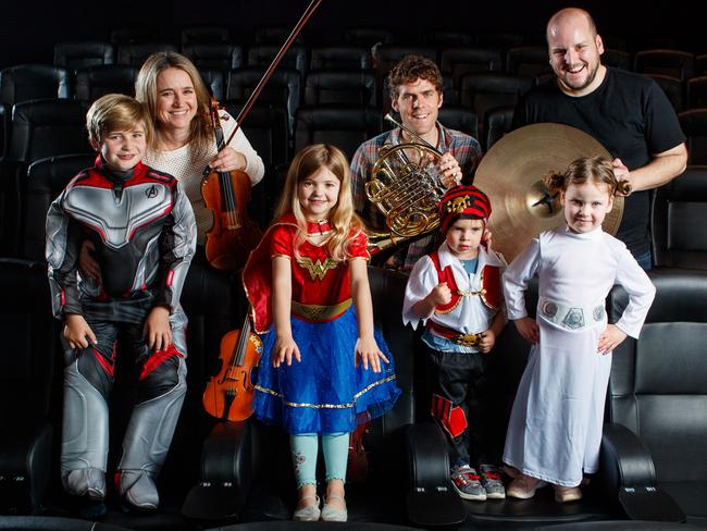 ASO musicians Emma Perkins, Adrian Uren and Andrew Penrose with Zach, 9, Ruby, 7, George, 3, and Erin, 5. Picture: Matt Turner.